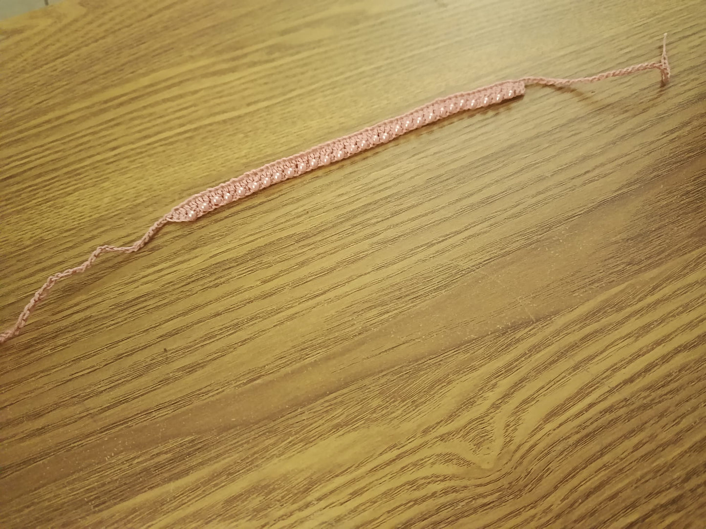 Bracelet de cheville rose perlé