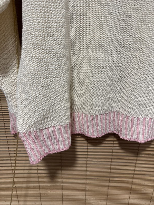 Pull col V bordure rose