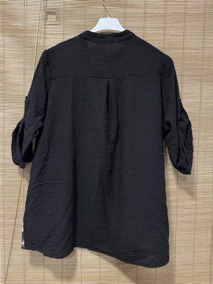 Blouse fleurie blanche et noire